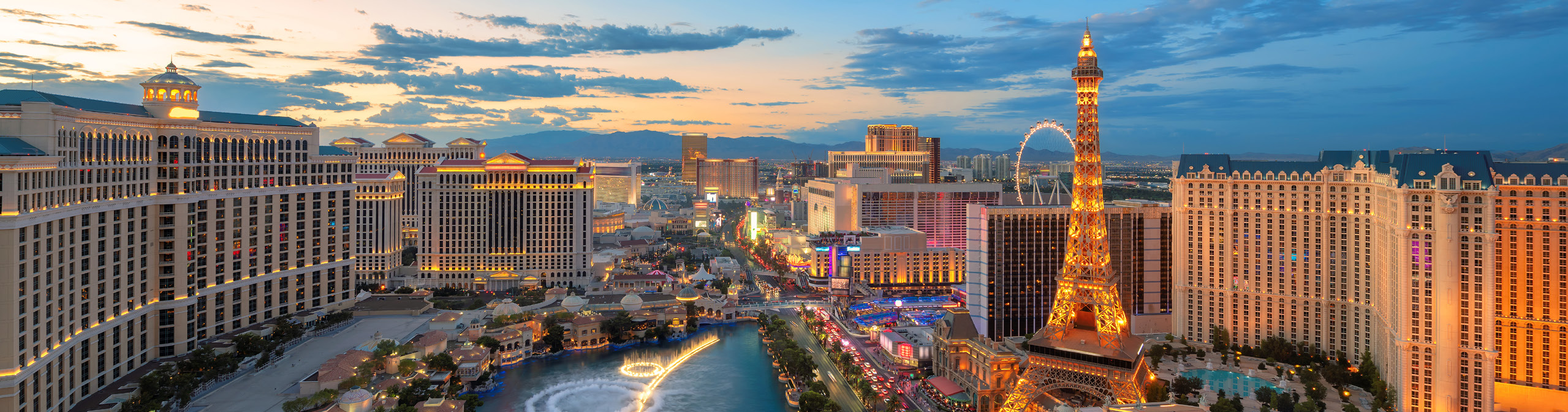 Las Vegas at sunset, from the Stay USA program packet; specific hotels are not guaranteed